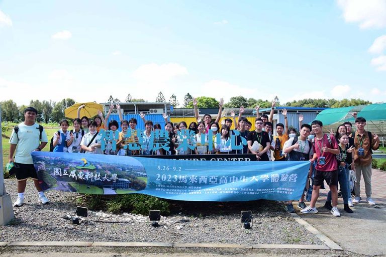 group photo at the entrance of Smart Agriculture Center