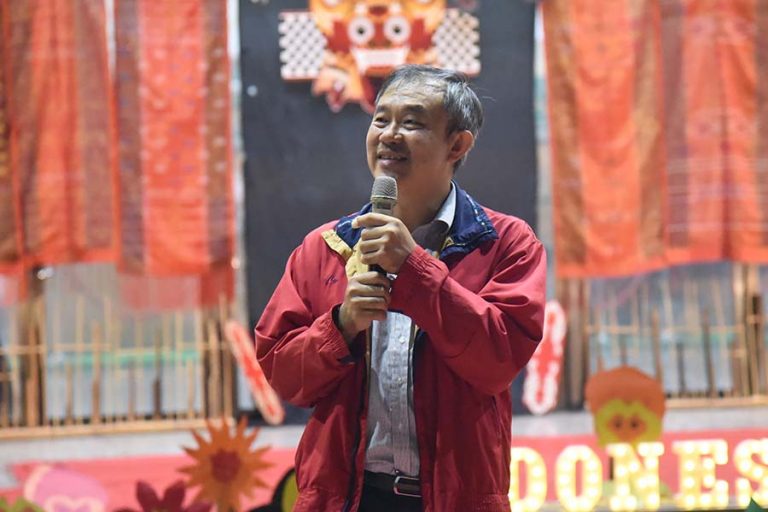 Dean J.C. Leong of the International College give a remark