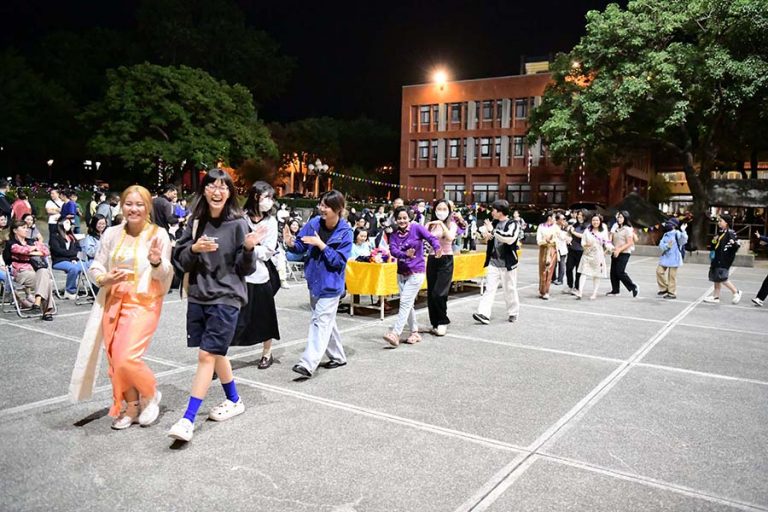 Foreigner students dance together happily