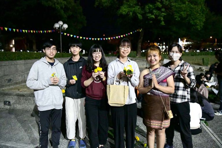 student making Loy Krathong