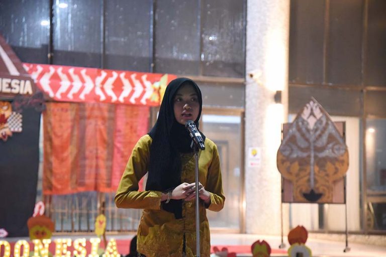 Indonesian Student performing National Anthem and traditional song
