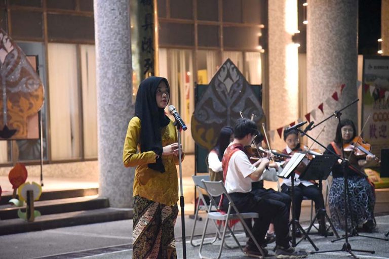 Indonesian Student performing National Anthem and traditional song