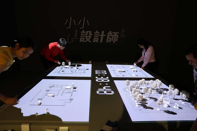 International students play interactive installations at Exhibition